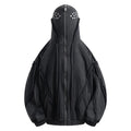 Black loose-fit zip-up hooded cardigan jacket with abstract pattern and padding on a hanger.
