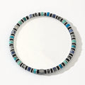 Close-up of a hand-woven cylindrical bohemian bracelet made from natural semi-precious stones in geometric patterns