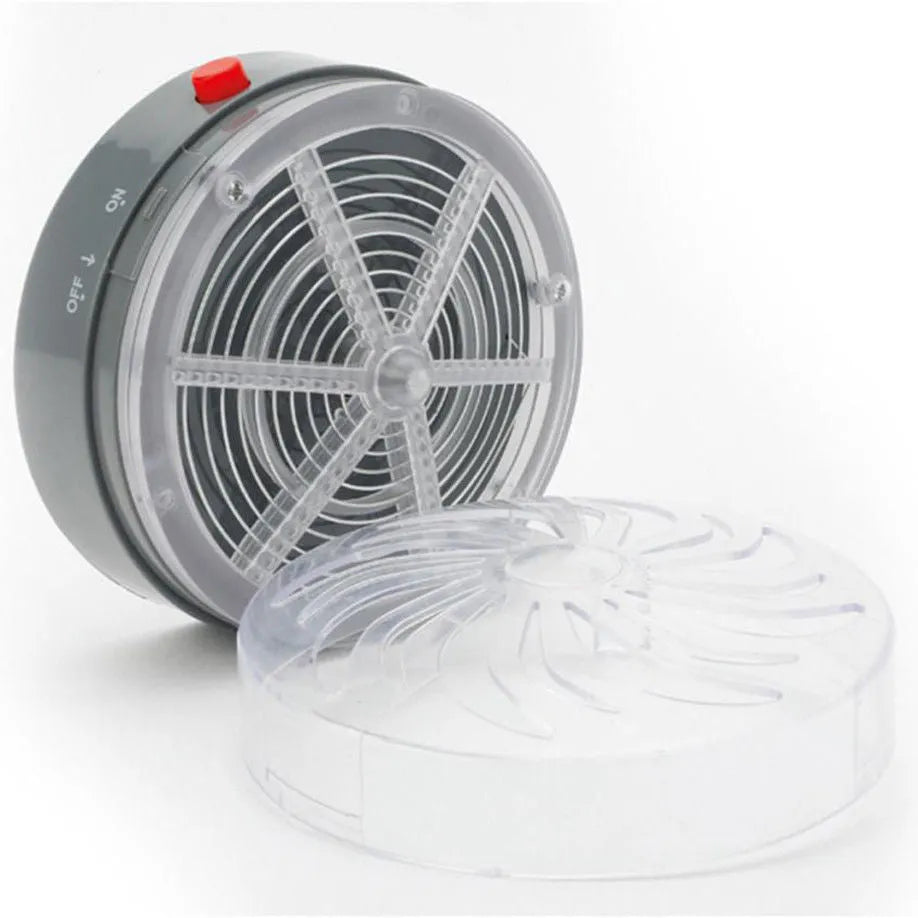 Solar bug zapper for mosquitoes and insects, white and black design on a table in a garden