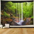 Large bohemian mandala and forest design tapestry hanging on wall, also shown used as a blanket.