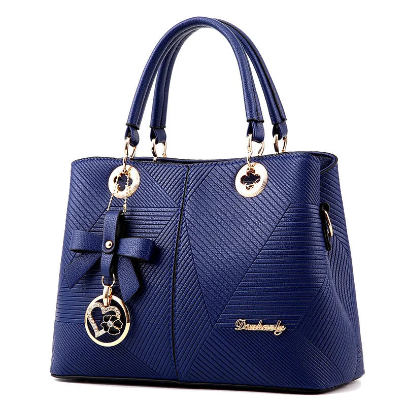 Retro style one-shoulder handbag in black with gold zipper, showing structured shape
