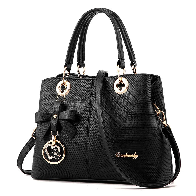 Retro style one-shoulder handbag in black with gold zipper, showing structured shape