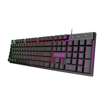Black USB wired backlit gaming keyboard with frosted keycaps on a desk.