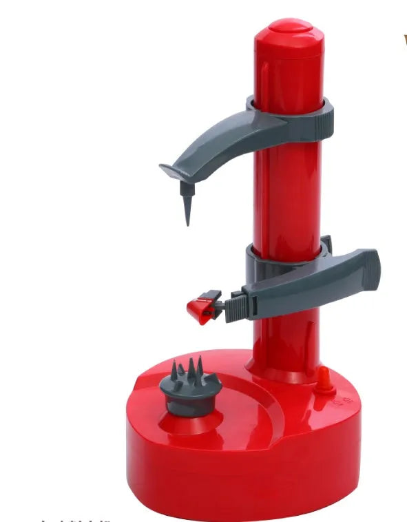 White electric fruit and vegetable peeler with stainless steel blade on a kitchen counter.
