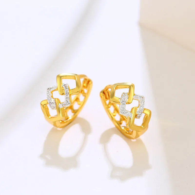 Geometric hollow-out gold-colour alloy earrings with ear clip fastening