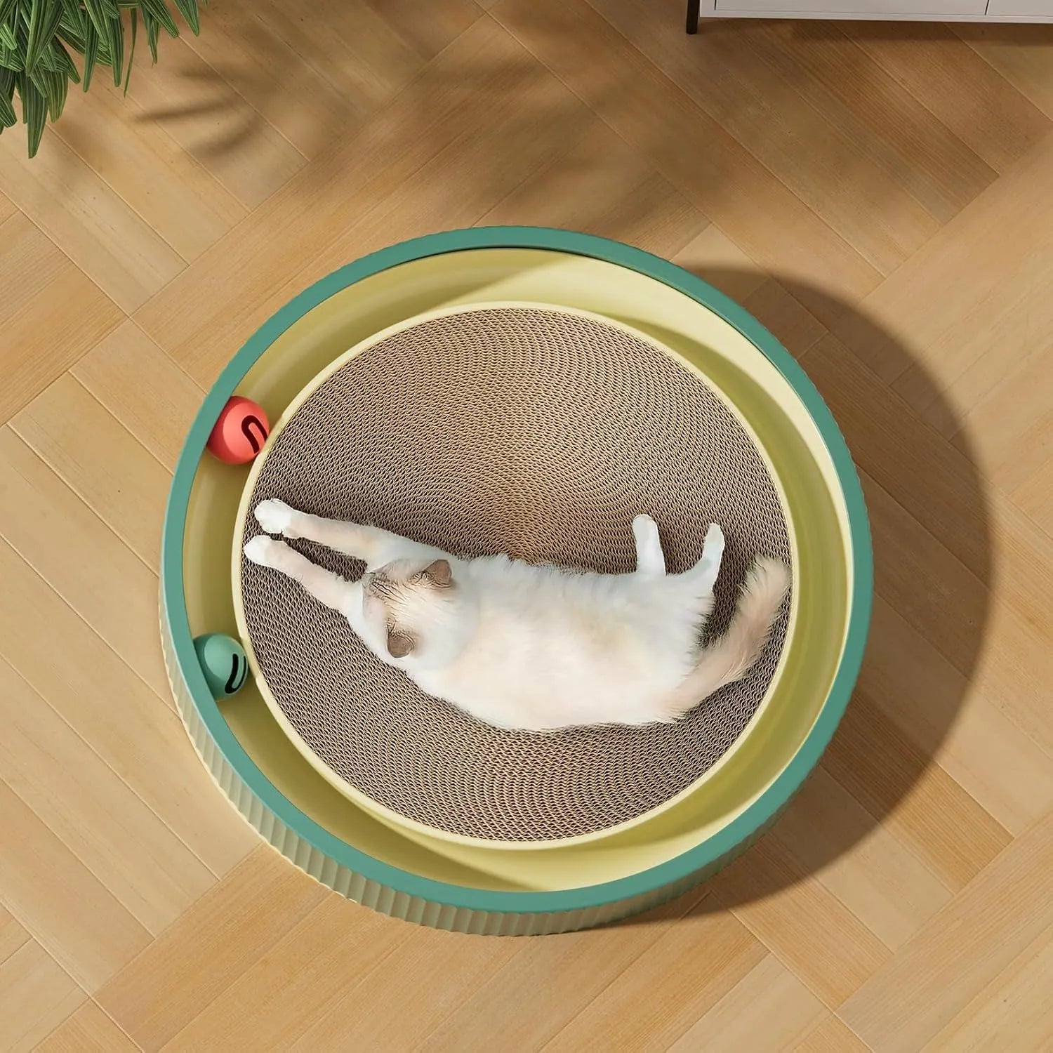 Large circular cat scratching board with moving ball toys measuring 45cm diameter