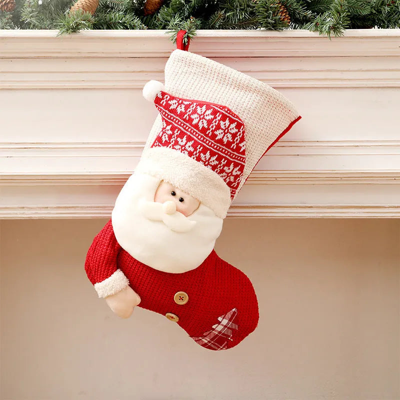 Large red and white knitted Christmas stocking with Santa Claus design for fireplace mantel decoration