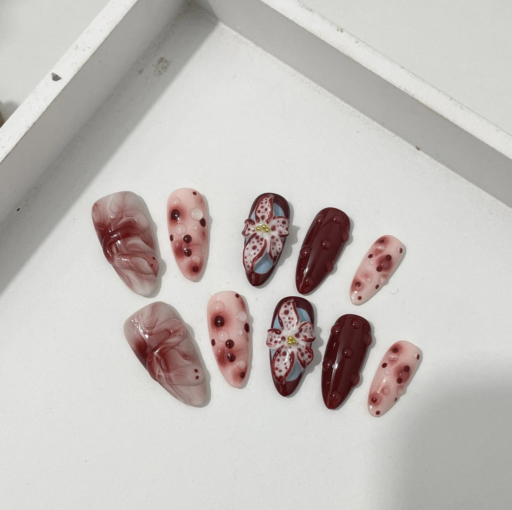 Hand-painted three-dimensional carved press-on nails in almond shape with rose, tulip, shell, bow, starry sky, butterfly, leopard print and XINGX patterns