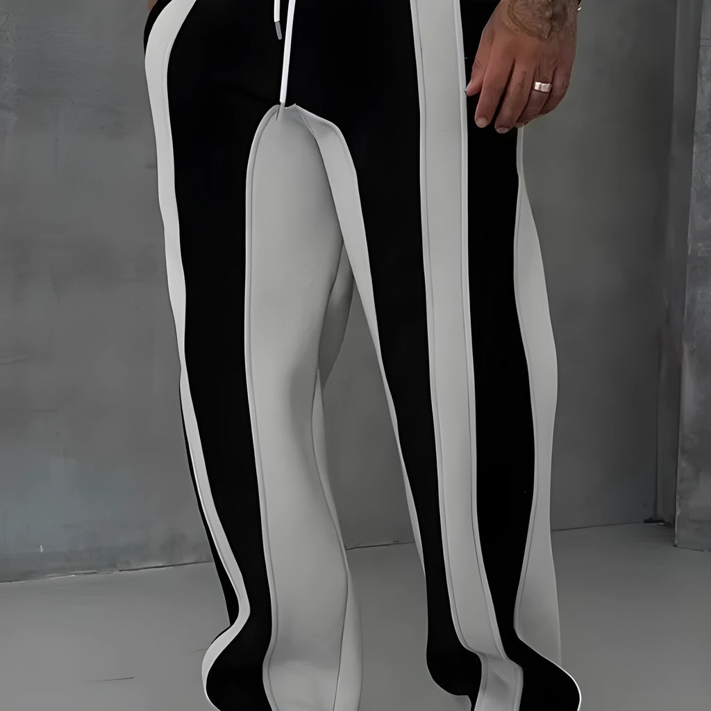Straight sports pants in loose fit polyester with digital print, black on the back option