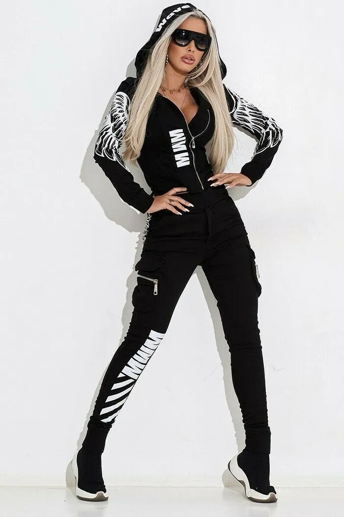 Black women's casual suit with wings print on zip hood top and matching trousers.