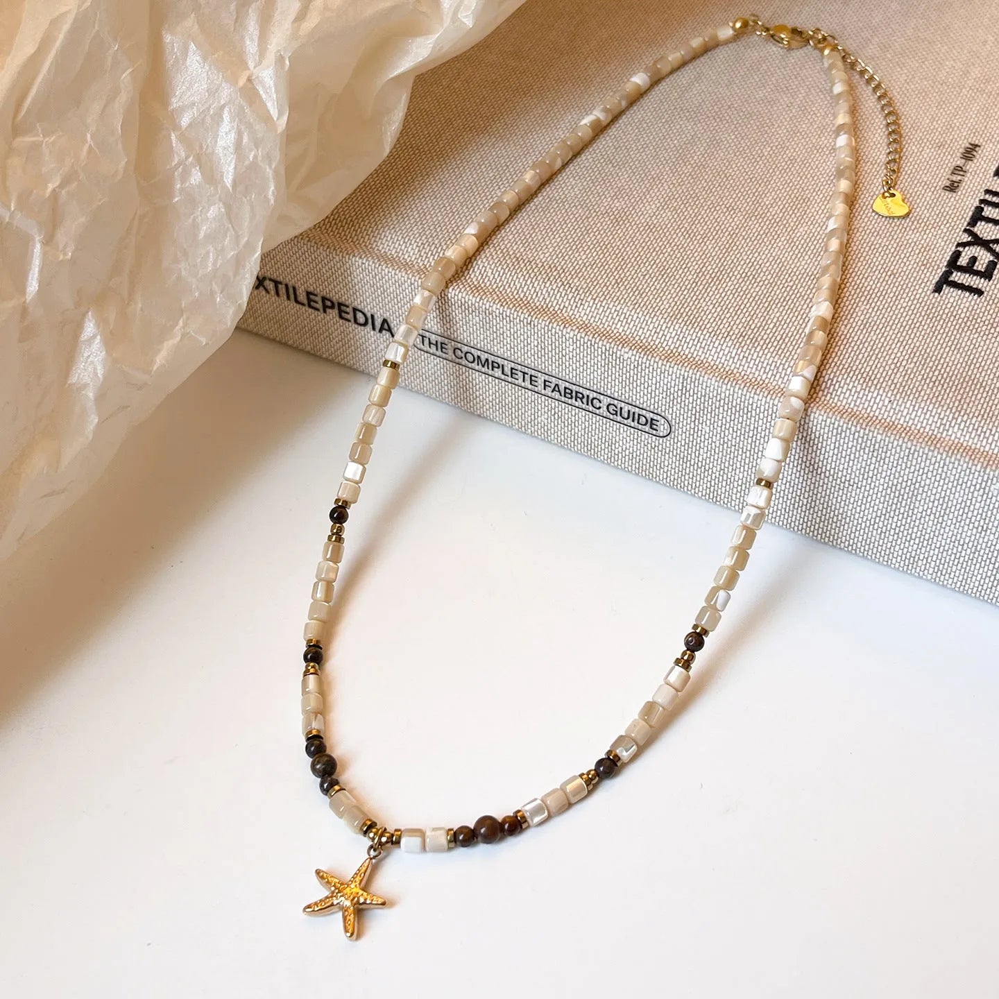 Titanium steel starfish pendant necklace with natural shell tigereye stone on beaded Maillard-style chain, 41-50cm