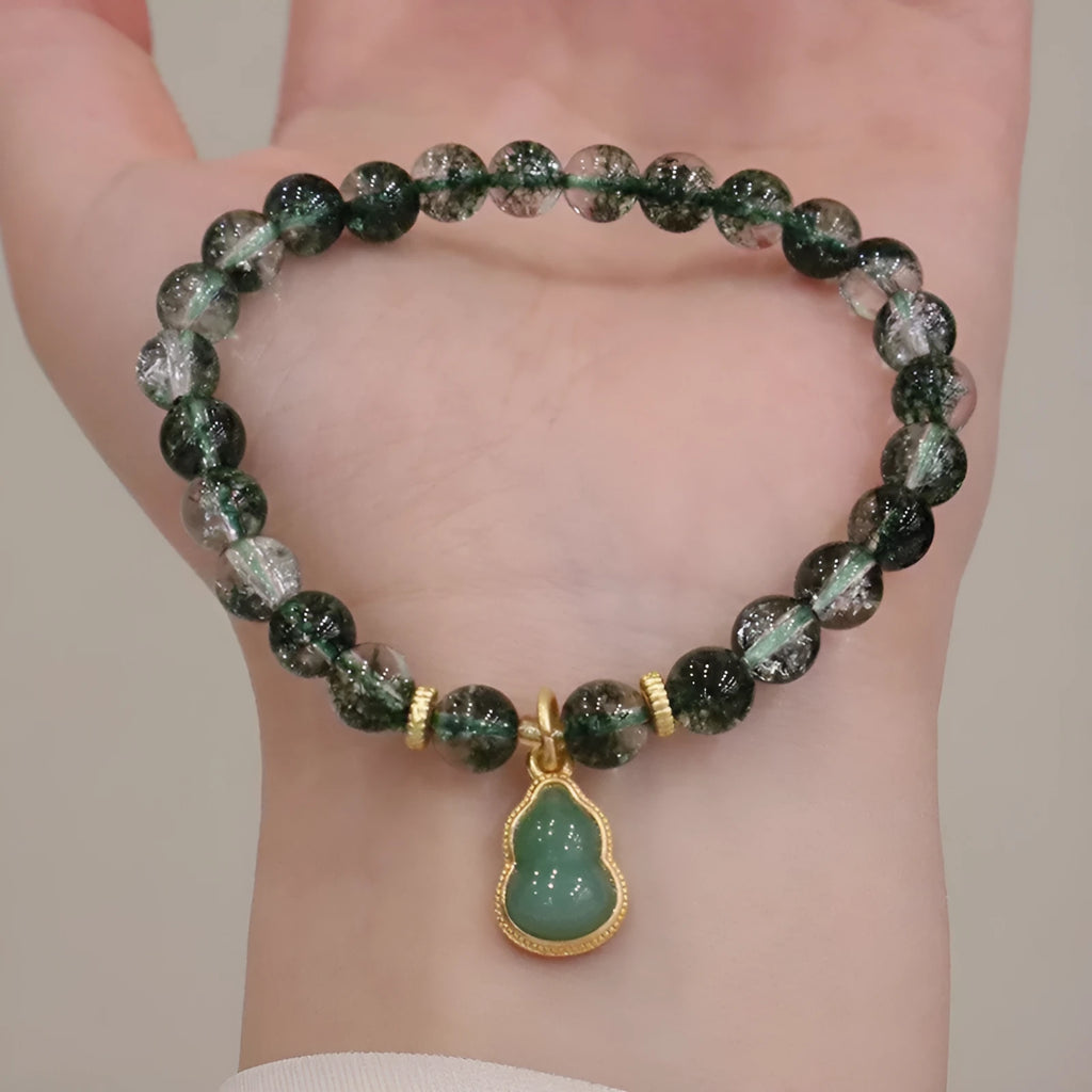 Handmade women's crystal bracelet with citrine, chorite, green phantom quartz hearts and pearls