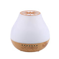 USB-powered ultrasonic essential oil aroma diffuser with wood grain finish and colourful LED lighting effects