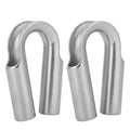 Set of stainless steel tubular chicken heart sleeve rings in various sizes on a workbench.