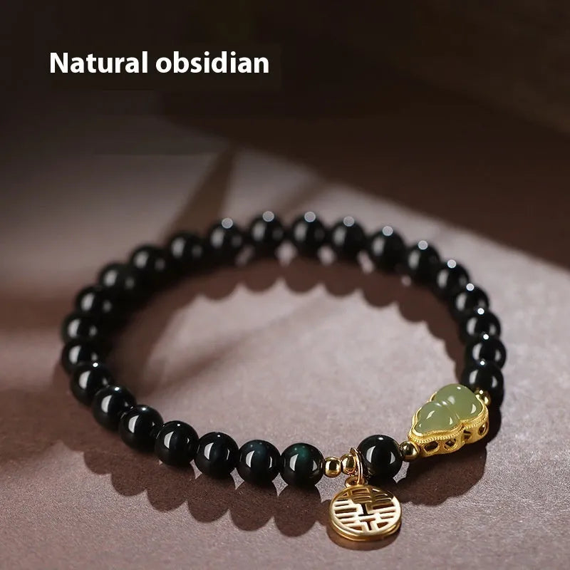 Black obsidian bracelet with a Hetian jade gourd charm, showing geometric beads in 6mm, 8mm, and 10mm size options.