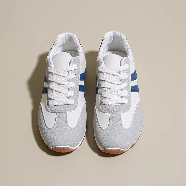 Blue and grey Cortez stripe casual sports shoes with flat heel and round toe on a wear-resistant rubber sole.