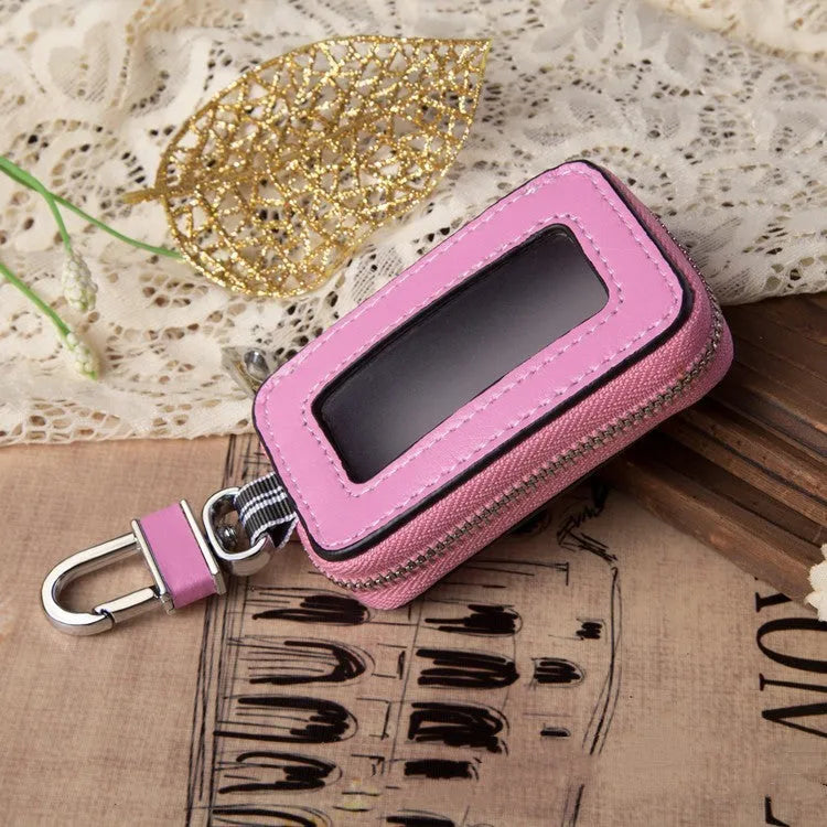 White genuine leather square car key case showing plain weave texture and dimensions.