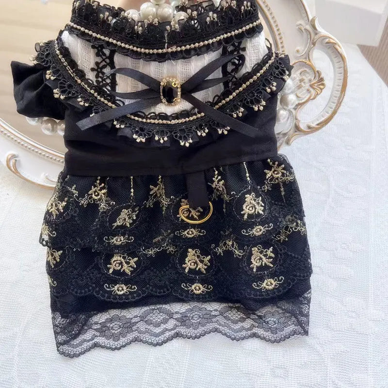 Golden Gothic-style princess skirt costume on a small dog, showing detailed sizing for pet clothing.