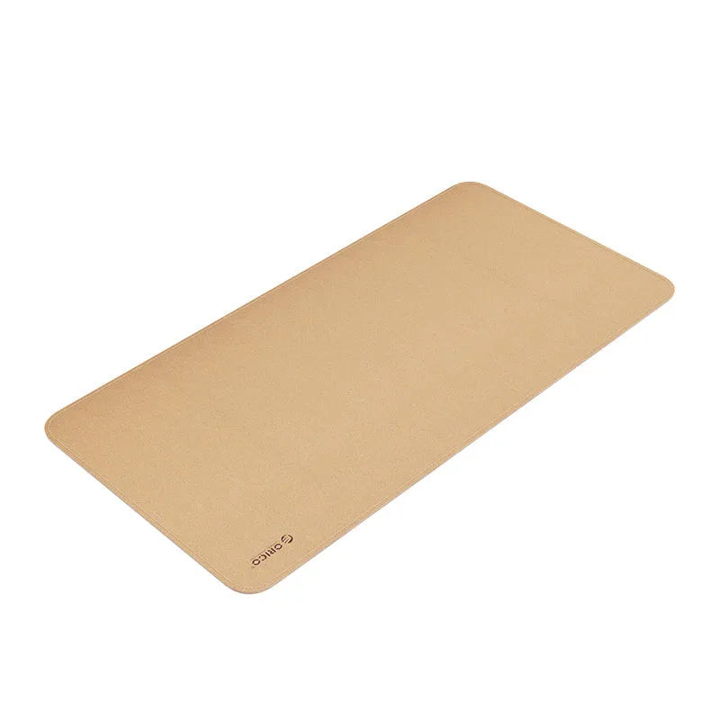 ORICO CMP-CF natural cork mouse pad with ground surface finish in brown cork colour on a desk