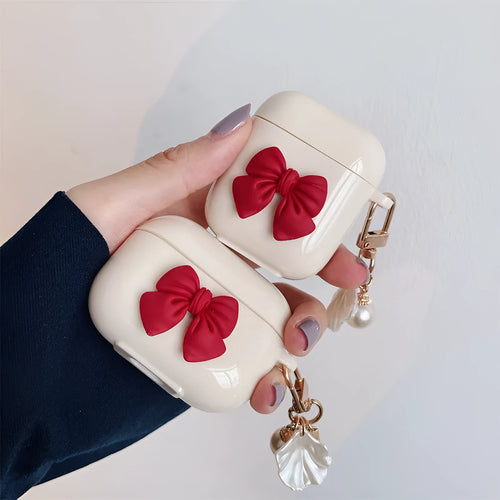 Beige red bow shell TPU clamshell case for AirPods Pro, AirPods 3, AirPods 1 and AirPods 2 wireless earphones
