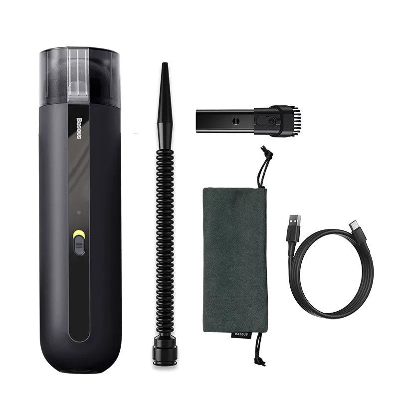 Starry sky black handheld car vacuum cleaner with a blowing hose attachment on a car seat.
