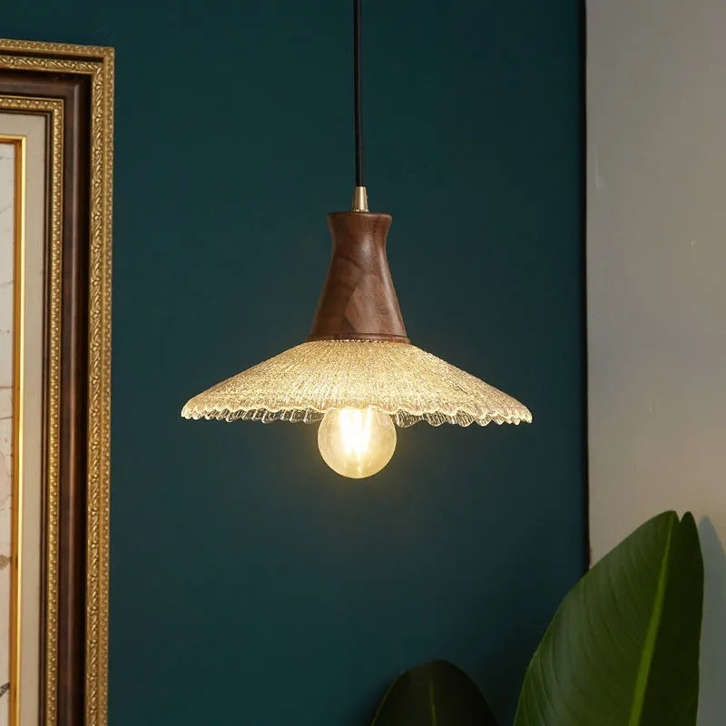 Retro brass and glass woodcraft chandelier ceiling lamp on a white background.