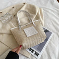 Straw woven large capacity shoulder bag with PU trim and retro styling