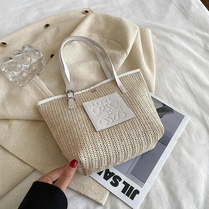 Straw woven large capacity shoulder bag with PU trim and retro styling