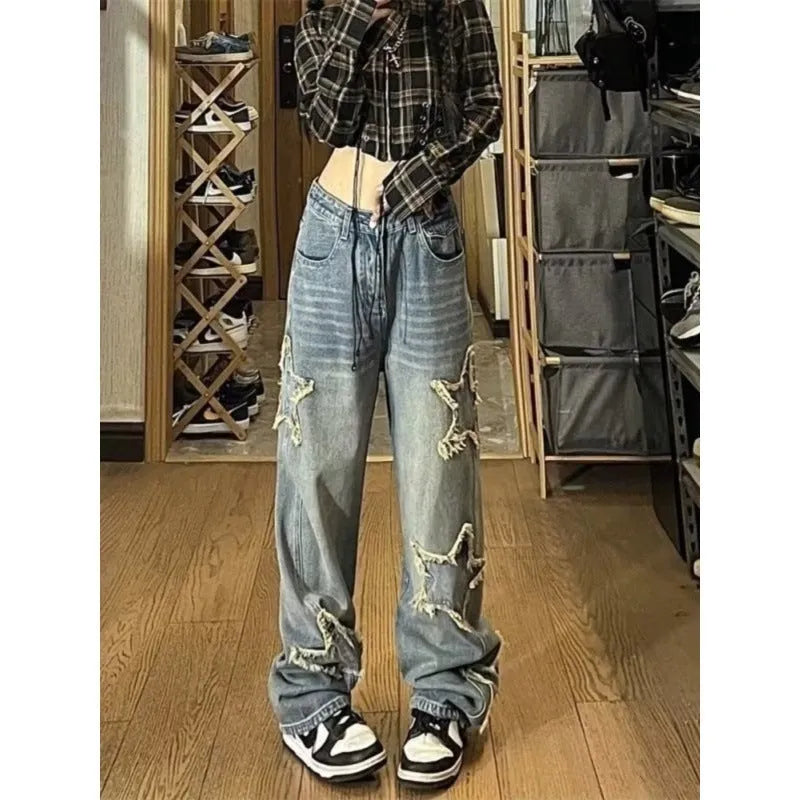 Blue denim women's jeans with high waist and wide straight leg cut