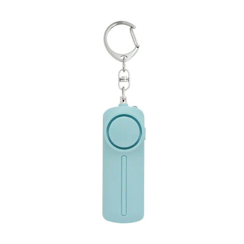 Compact pink personal safety alarm with keyring, showing dimensions 86mm by 30mm.
