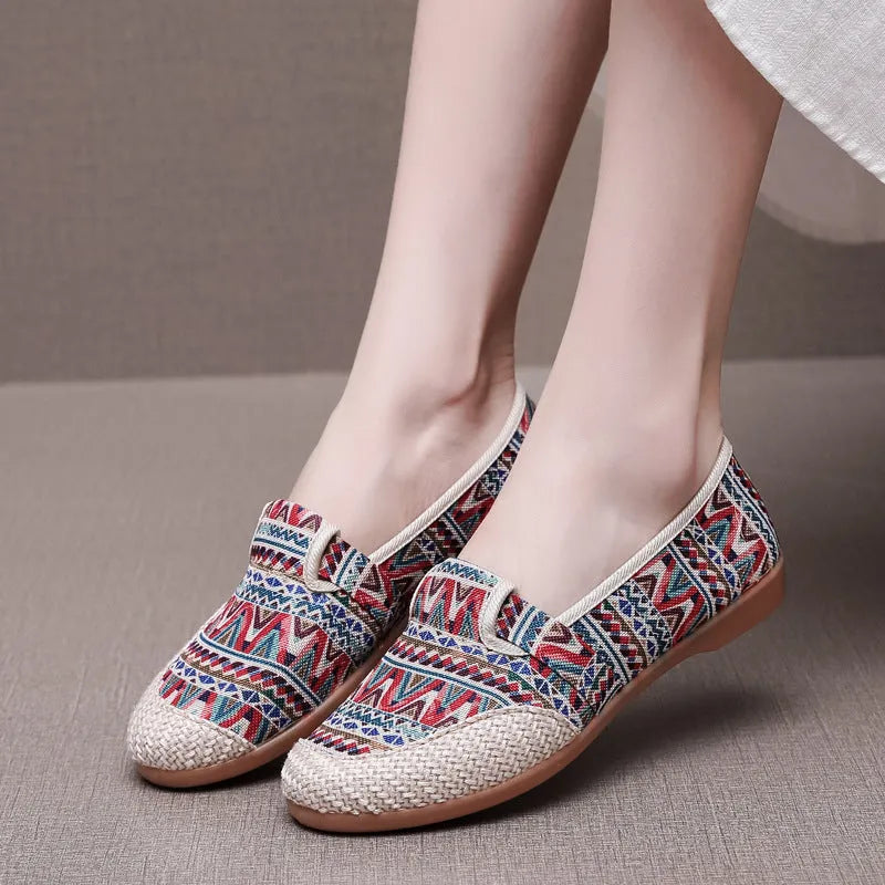 Women's flat-heel ethnic style cloth shoes in assorted colours with colour stitching and a shallow mouth design