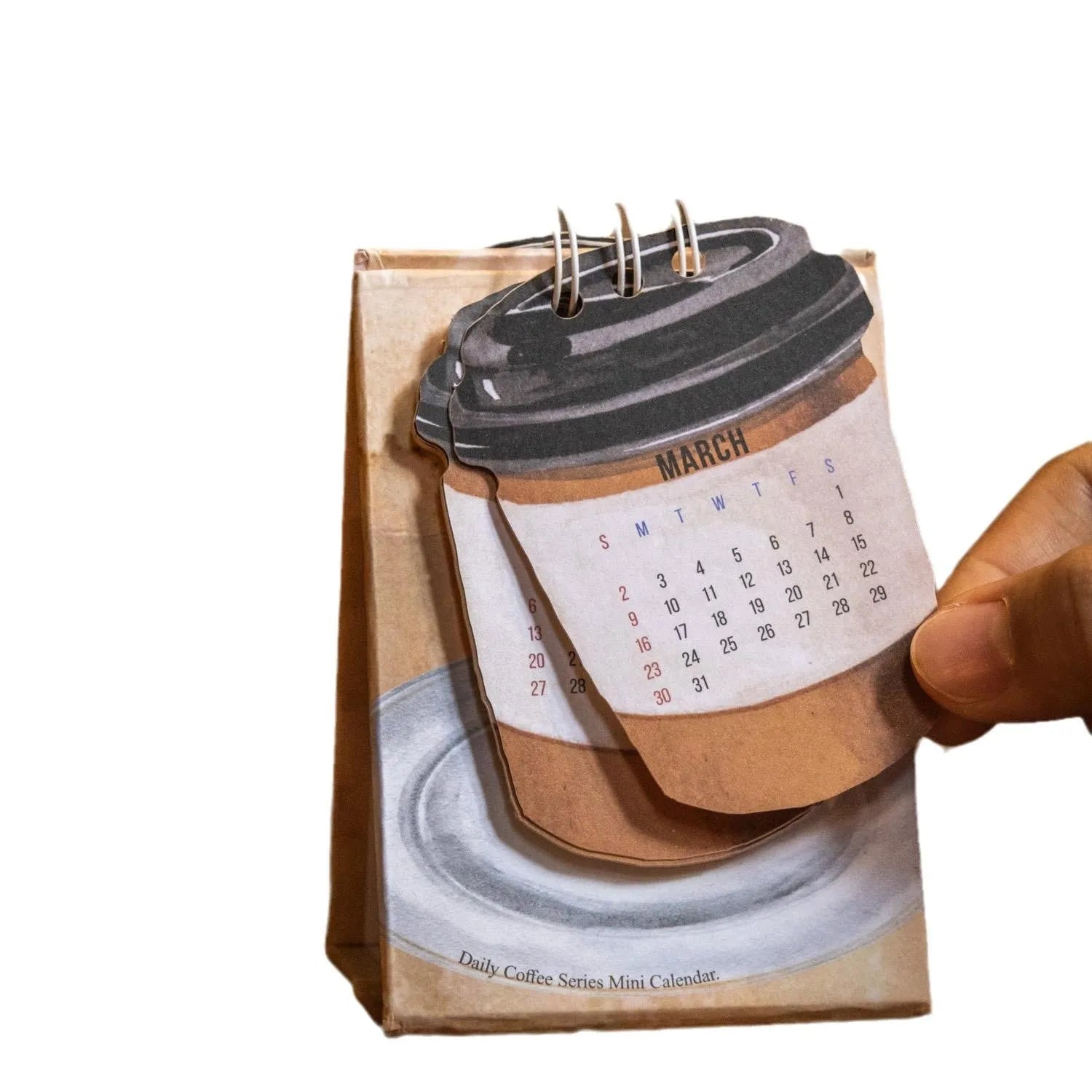 Four mini paper desk calendars for 2025 with different motivational themes in simple modern design