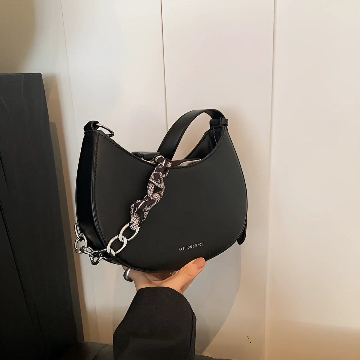 Small PU saddle shoulder bag with sandwich pocket and phone compartment, shown in black, brown, coffee, green, khaki or white.