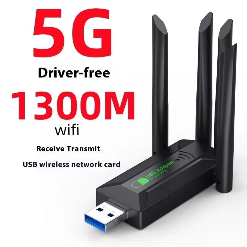 Black USB network transmitter with four external antennae for computer Wi-Fi signal boosting.