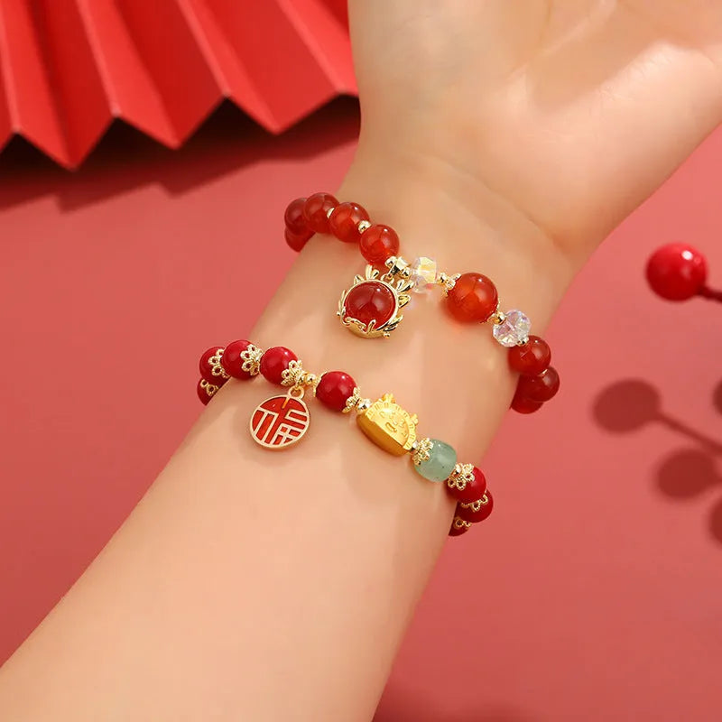 Chinese style natural stone beads bracelet with lucky coin and agate beads on white background