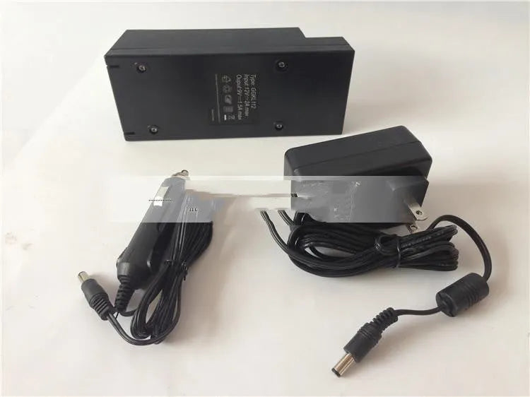 GKL112 white dual USB car charger with UK three-pin plug, shown next to a car's 12V dashboard socket.