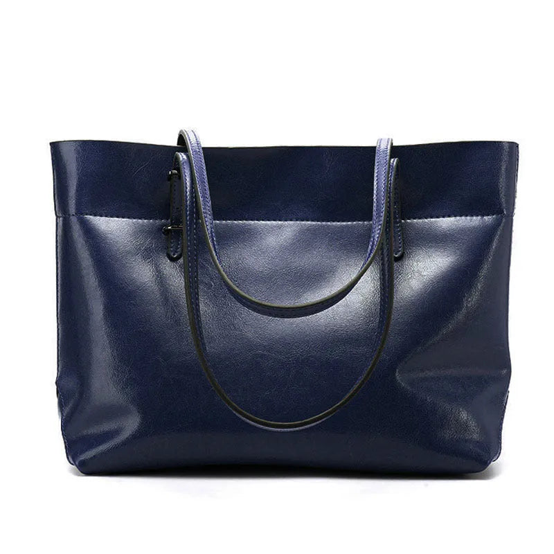 Brown waxed cowhide cross-body handbag showing front view, internal phone pocket, and adjustable leather strap.