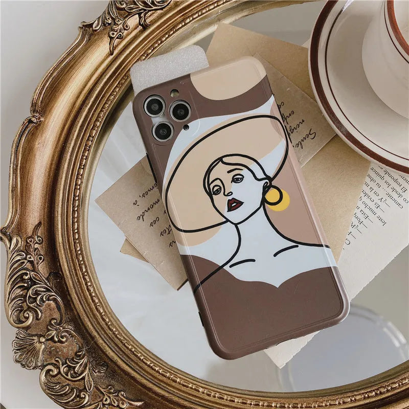 Orange yellow soft gel iPhone case with hand-drawn line art cartoon design.