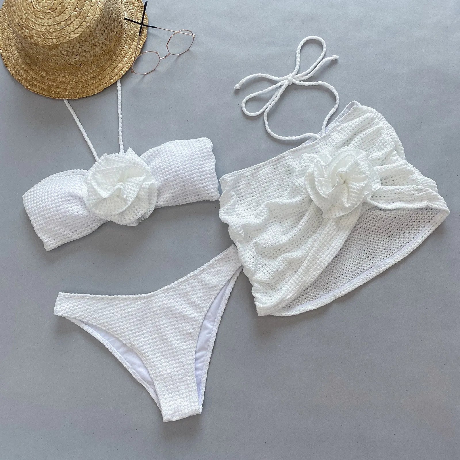 Women's 3D flower split bikini set in white or purple showing bra, panties, and skirt pieces