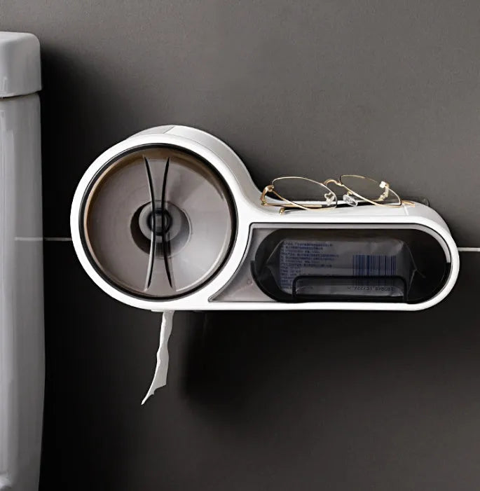 White plastic toilet roll holder with curved design on bathroom surface
