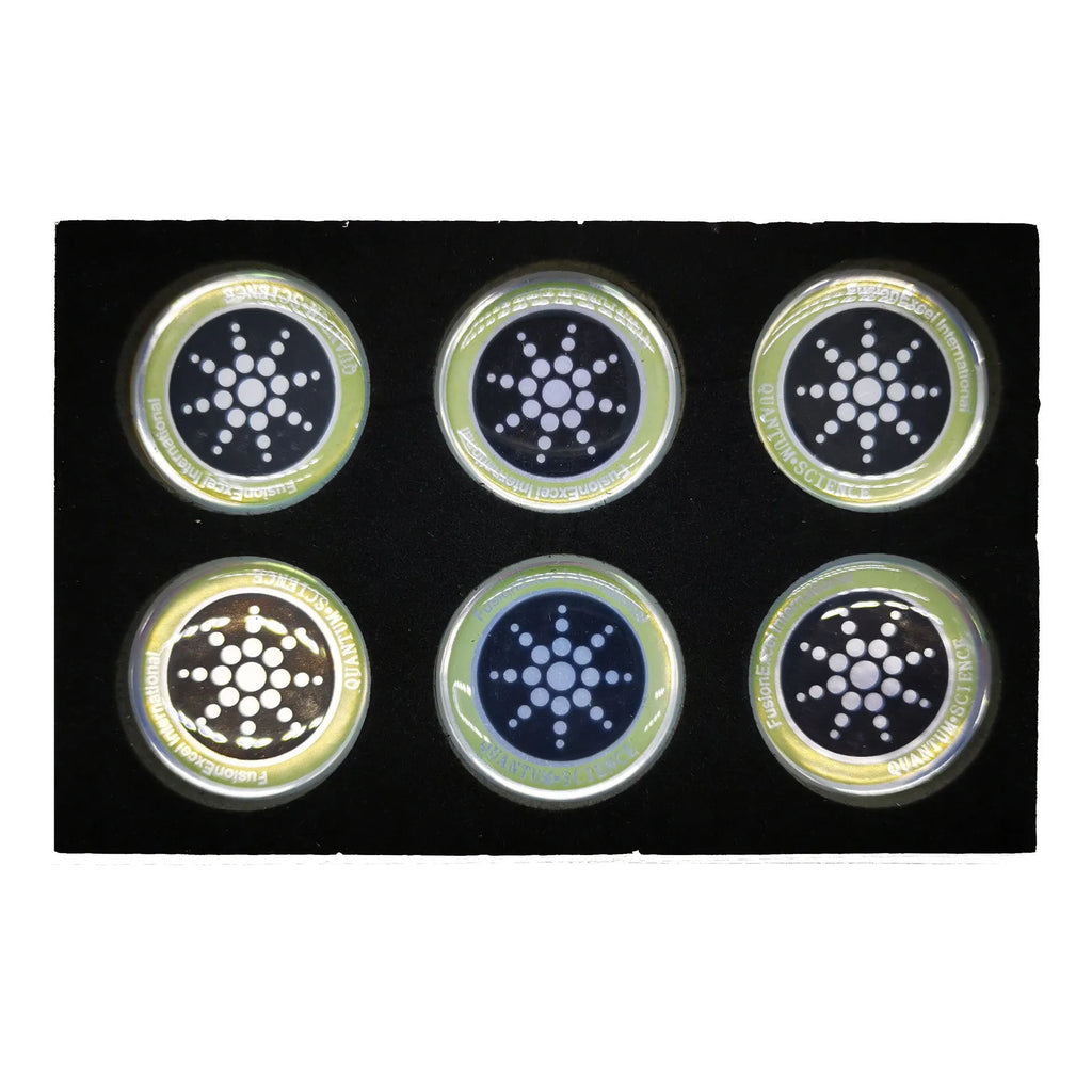 Six mobile phone anti-radiation stickers in silver and gold colours with self-adhesive backing