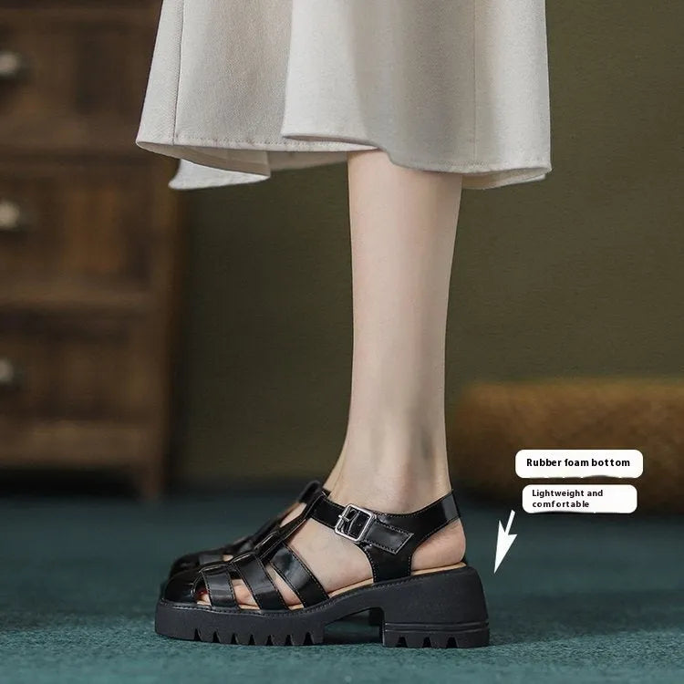 Women's retro closed-toe platform sandals with chunky heel and buckle strap in beige.