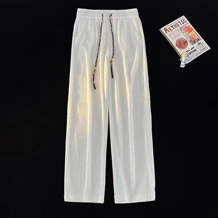 Korean-style men's loose straight-leg trousers with drooping texture in black or white for summer casual wear