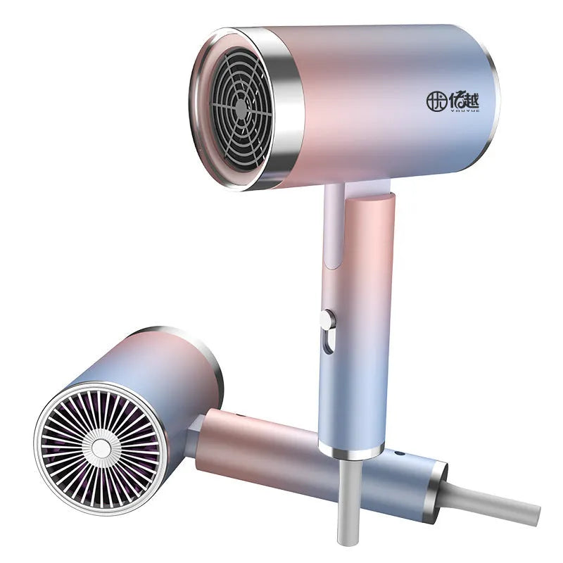 Foldable household hair dryer in emerald green with negative ion technology and four speed settings
