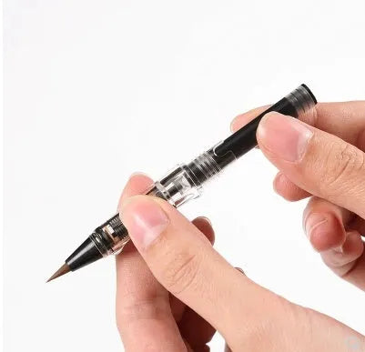 Ten steel ink sacs for fountain pen and dip pen repair laid out showing metal construction