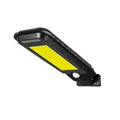Solar human body induction wall lamp with 20 LED patches and ABS plastic housing on a white wall