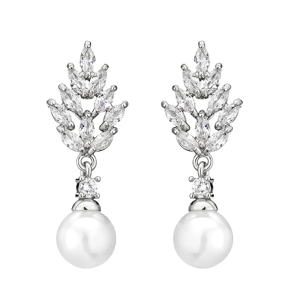 Geometric floral design earrings with micro inlaid zircon detail in gold, platinum, and rose gold finishes.