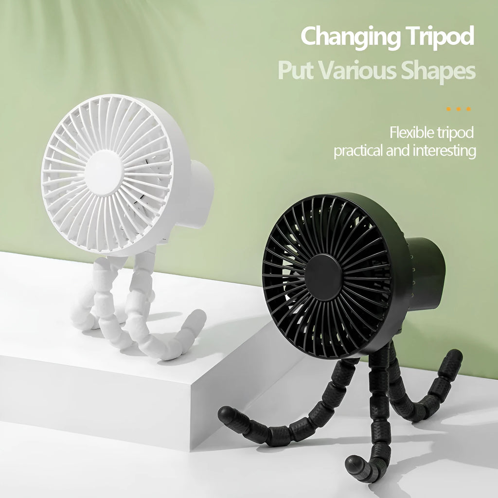 Small black adjustable tripod desktop fan with bending neck and clip, shown on a desk.