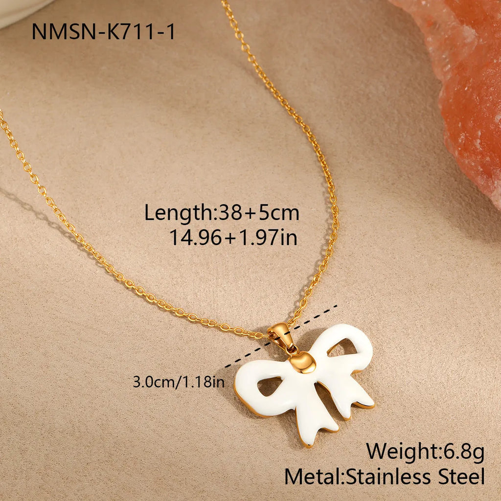 Bowknot white necklace with stainless steel pendant and electroplated finish on regular chain