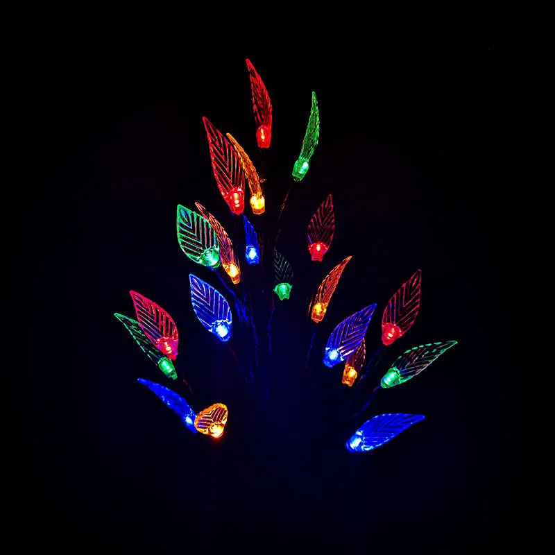 Solar-powered leaf branch garden light measuring 73cm tall with iron and plastic construction